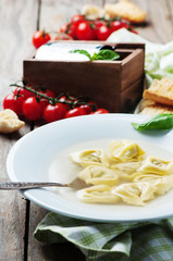 Italian traditional cooked tortellini on the table