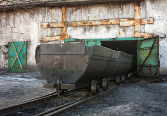 Fototapeta na wymiar Empty trolley on mine yard. Ukraine, Uglegorsk