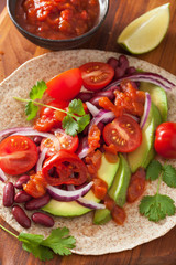 vegan taco with vegetable, kidey beans and salsa