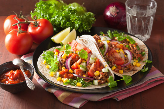 mexican tacos with beef tomato salasa onion corn