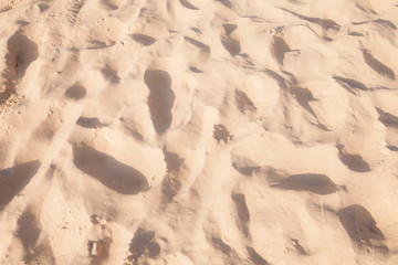 sand pattern of a beach in the summer background.