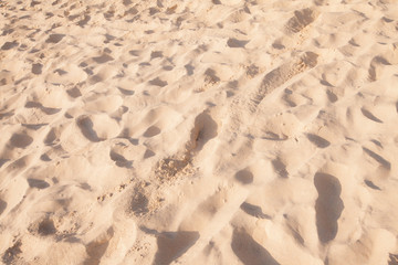sand pattern of a beach in the summer background.
