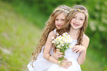 Portrait of two girls in the woods girlfriends