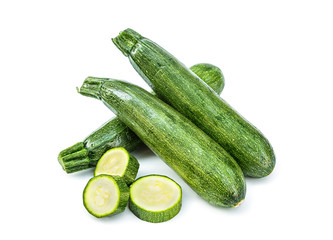 Fresh healthy green zucchini isolated on white background .