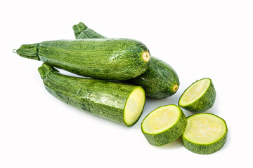 Fresh healthy green zucchini isolated on white background .