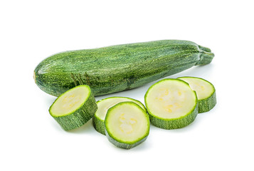 Fresh healthy green zucchini isolated on white background .