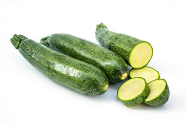Fresh healthy green zucchini isolated on white background .