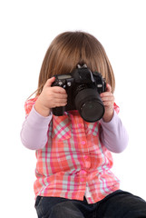 Two-year-girl and still camera