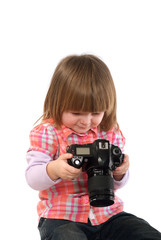 Two-year-girl and still camera
