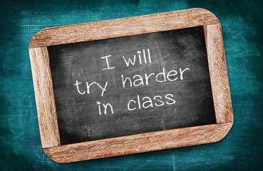 I will try harder in class written on a blackboard / intention c