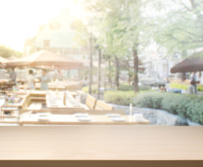 Table Top And Blur Building Background