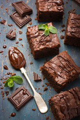 homemade chocolate brownies on dark background