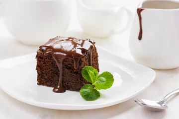 Gordijnen chocolate brownies on white background © anna_shepulova