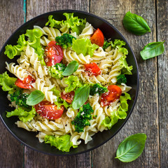 Pasta salad with cherry tomatoes and broccoli