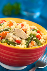 Couscous dish with chicken, green bean, carrot, red bell pepper