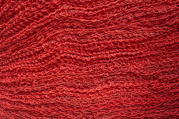 closeup decorative design knitted red background