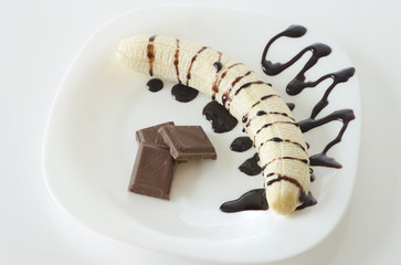 Banana with chocolate topping and bars