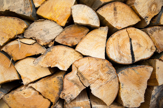 Dry chopped firewood logs ready for winter. 