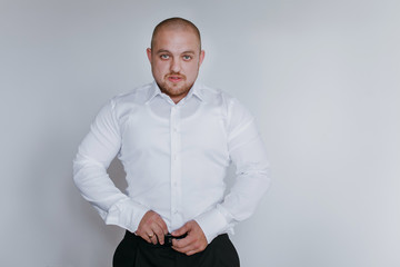 groom  is preparing for his wedding