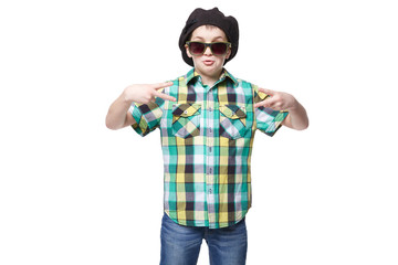 Little boy with a cap and glasses doing victory gesture