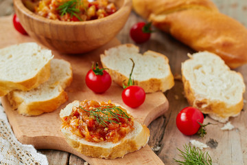 Vegetable caviar on a slice of baguette