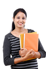 Female student holding books