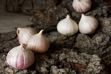 garlic on a gray background. Dietary cuisine