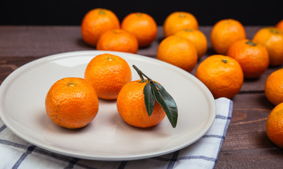 three tangerines