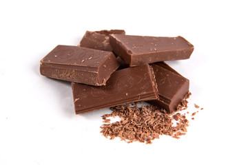 Chocolate pieces isolated on white background