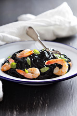 Squid ink homemade pasta with shrimp