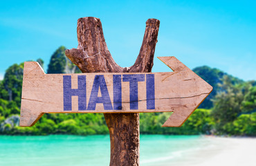 Haiti wooden sign with beach background