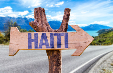 Haiti wooden sign with road background - obrazy, fototapety, plakaty