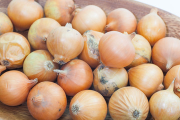 Close - up Pile of small gold onion