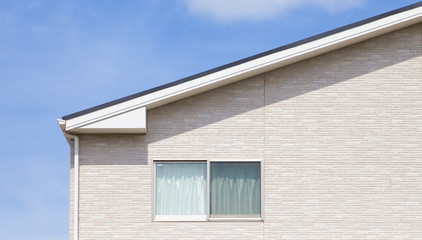Detail of house exterior wall and window