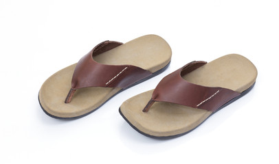 Fototapeta premium Brown leather slipper isolated on white background