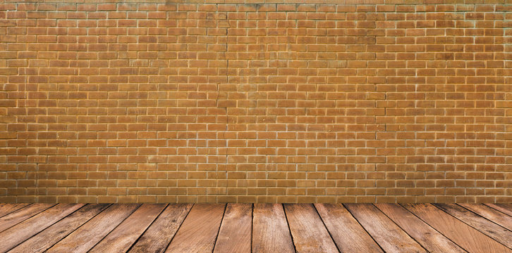 Wood floor and brown brick wall background