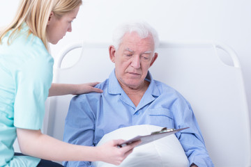 Doctor talking patient about cancer