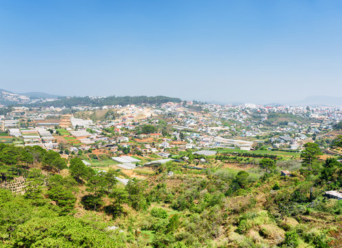View of the valley of agricultural lands and Da Lat city (Dalat)