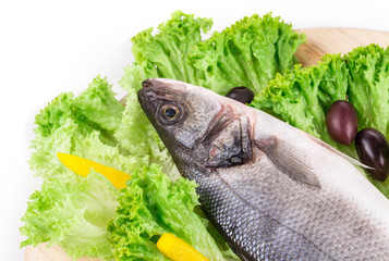 Composition of fresh seabass and vegetables.
