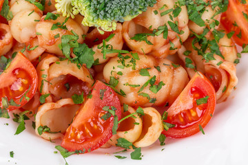 Spaghetti with tomato and basil.