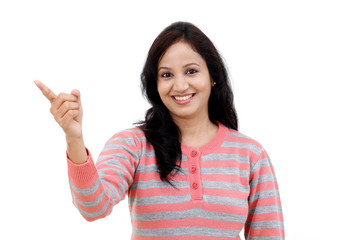 Young Indian woman showing blank copy space