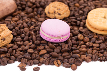 Cookies on coffee beans with macaroons.