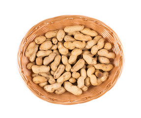 Basket full with peanuts.