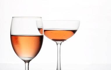 The sparking rose wine in the wine glass couple set