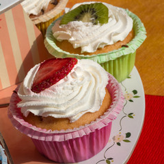 kiwi and strawberry dessert fruit pastries with whipped cream