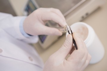 Scientist doing experimentations in tubes