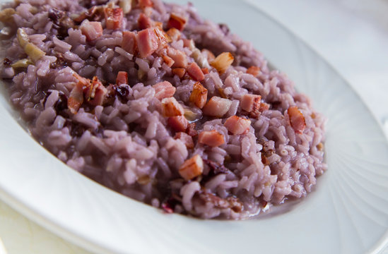 Risotto creamed with barolo with radicchio and crispy bacon
