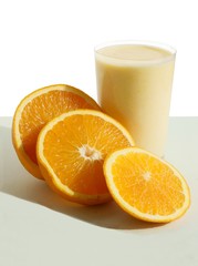 joghurt and grinded oranges as tasty beverage