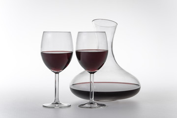 Red wine in decanter and glasses