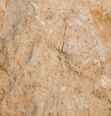 Uneven stone background texture with crack
